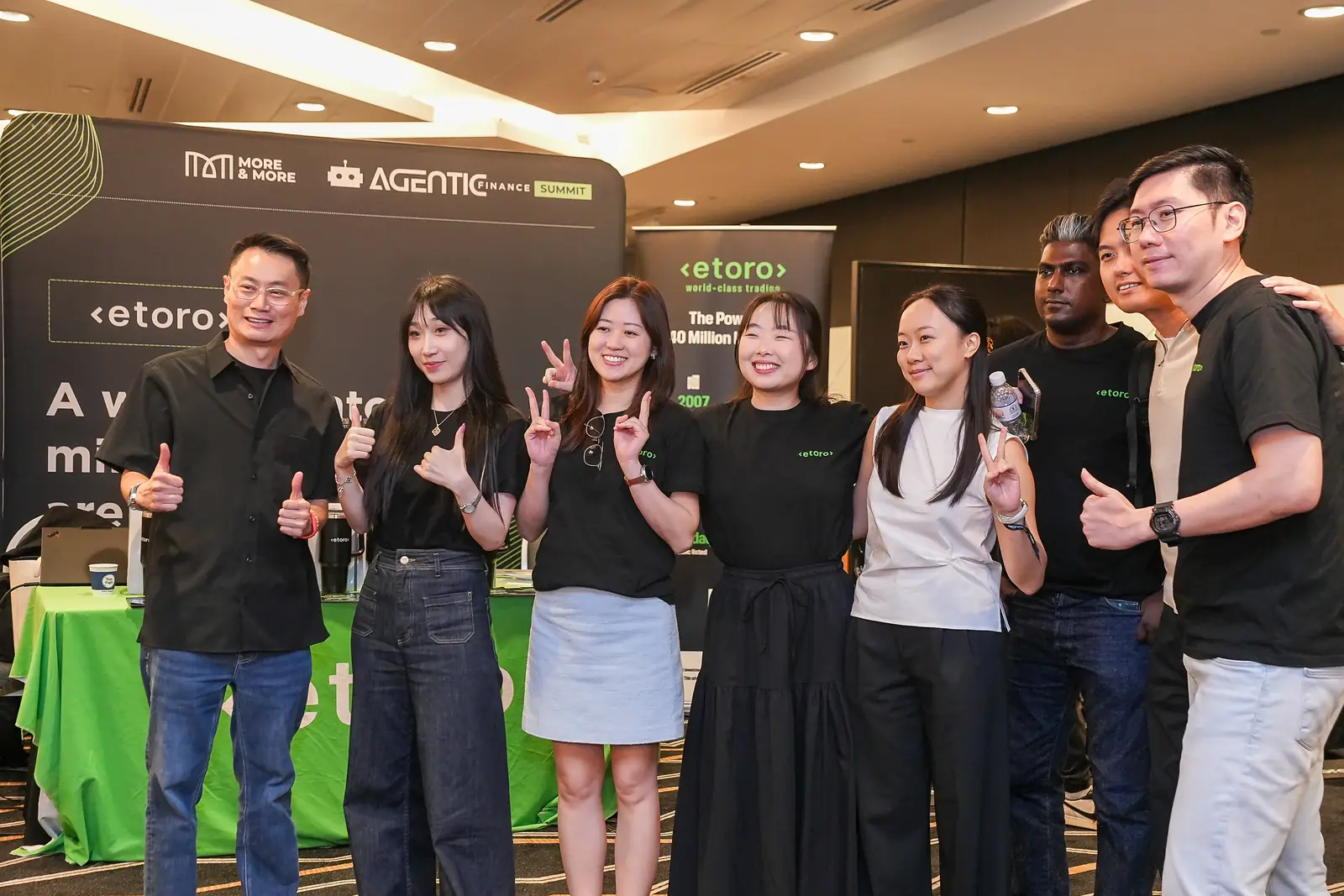 The eToro team at its branded area at Agentic Finance Singapore